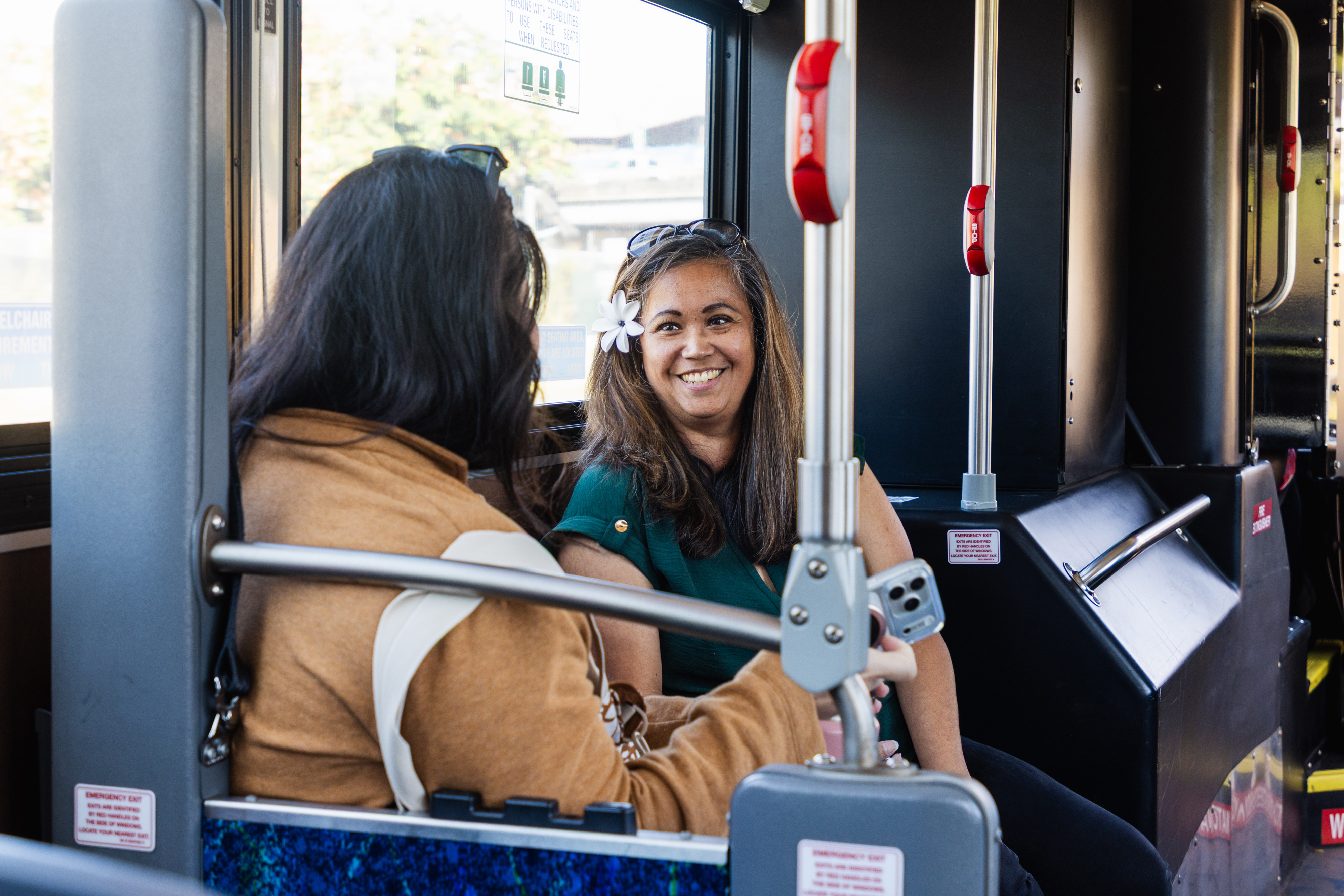 Image of working professionals on the bus